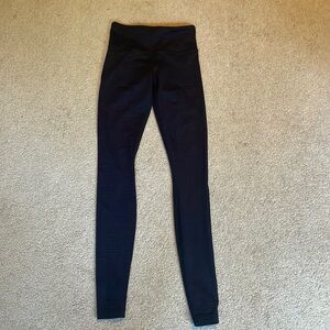 Black and purple Lululemon leggings size 2 in great condition. Barely worn.